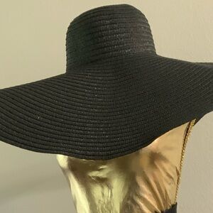 Black Straw Hat & Black Shorts.